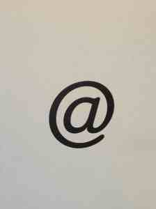 Installation view of @ (1971), ITC American typewriter medium, at MoMA