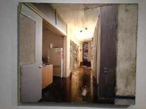 Installation view of Naomi Safran-Hon’s Home Invasion (2011). Archival inkjet print, lace, and cement on canvas