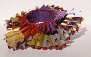 Luis Acosta’s 2009 bracelet is made of six layers of stitched paper. Photo: Luis Acosta
