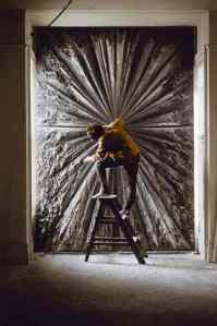 Jay DeFeo working on what she then called The Death Rose, 1960. Photo: Bert Glinn. © Bert Glinn/Magnum Photos