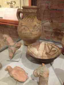 Among dozens of ceramic items dug up by the Met are grapevine-decorated earthenware jugs to transport locally made wine from the Oasis to the Nile and upriver to Cairo.