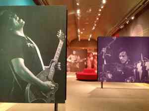 Installation view with photos of Stevie Salas, Jessie Ed Davis, and Randy Castillo.