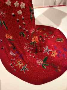 Embroidered train of Zang Toi’s 1991 red-carpet knit dress worn by Gong Li