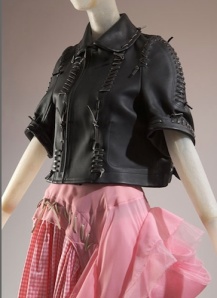 From Rei Kawakubo’s 2005 Biker + Ballerina collection (leather, gingham, and tulle) for Comme des Garcons. Source: FIT.