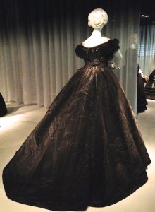 Dramatic 1861 British mourning attire in black silk moiré.
