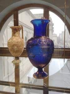 Two identical one-handled Ennion jugs from different sites. On right, the only Ennion piece with an intact foot, 1st c. A.D.