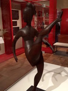 Nadelman’s high-kicking cherry wood “Dancer” sculpture (1922) on loan from the Jewish Museum