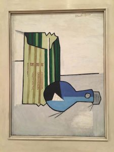 1924 painting of electric bulb and package. Collection: Dallas Museum of Art