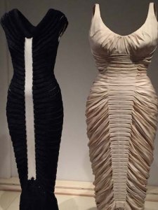 Azzedine Alaia’s 1994 slinky, downy knit dress next to its inspiration, “La Sirene” (1951-52) by legend Charles James